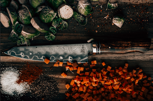Folded Steel Chef Knife dicing vegetables